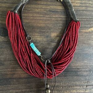 ESD Charleston. vibrant, red, vintage beaded necklace w/ natural fiber clasp.